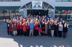 a group of our employees standing outside